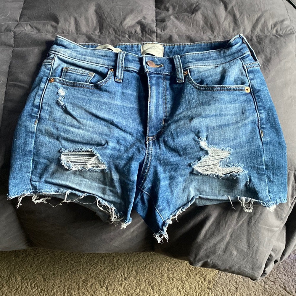 Ripped denim shorts